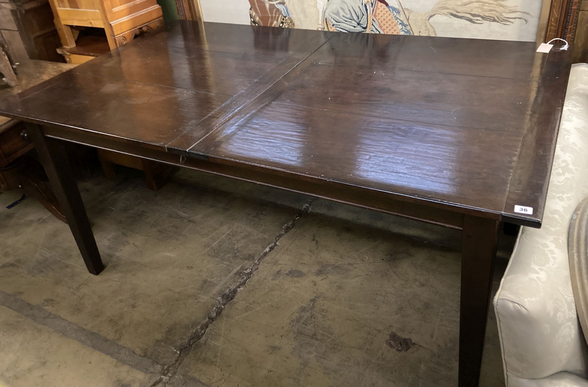 A 19th century style French rectangular walnut extending dining table, 220cm extended width 100cm height 78cm